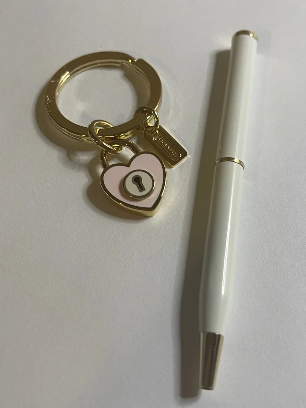 Coach Gold Heart Lock Keychain with Pink Enamel Accent and Coach Pen